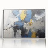 Framed abstract wall art featuring dynamic strokes and lines in various shades of blue and gold, adding a modern touch to any decor.