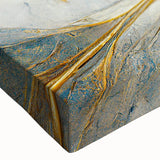 Close-up of a stretched canvas wall art piece showcasing an abstract design of colorful strokes and lines, ideal for modern home decor.