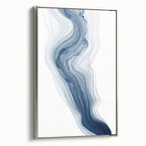 Framed abstract wall art featuring dynamic strokes and lines in vibrant colors, displayed with a sleek silver frame from a stylish side view.