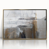 Framed abstract wall art featuring dynamic gold strokes and lines on a white background, enhancing modern decor and artistic ambiance.