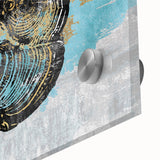 Close-up of an abstract wall art piece showcasing vibrant strokes and lines in bold colors, set against a sleek acrylic glass background, perfect for modern decor.