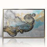 Framed wall art featuring an abstract design of strokes and lines in gold and black, showcasing a modern aesthetic perfect for contemporary home decor.