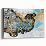 Framed canvas wall art featuring an abstract design of strokes and lines in shades of silver and gray, showcasing a modern aesthetic ideal for contemporary decor. The piece is elegantly displayed from a side view, emphasizing its sleek frame and artistic texture, perfect for enhancing living spaces.
