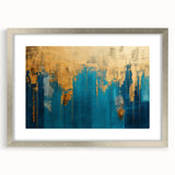 Framed abstract wall art showcasing vibrant strokes and lines in blue, gold, and silver, accented with a sleek mat and modern design.
