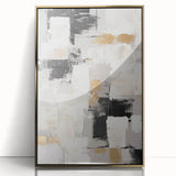 Framed wall art featuring an abstract design of gold strokes and lines, set against a white background, creating a modern aesthetic for stylish decor.