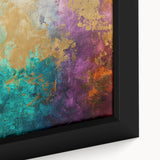 Close-up of a framed abstract wall art piece showcasing vibrant strokes and lines in bold colors, perfect for modern decor enhancement.