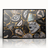 Framed wall art featuring an abstract design of colorful strokes and lines, presented in a sleek black frame, ideal for modern home decor.