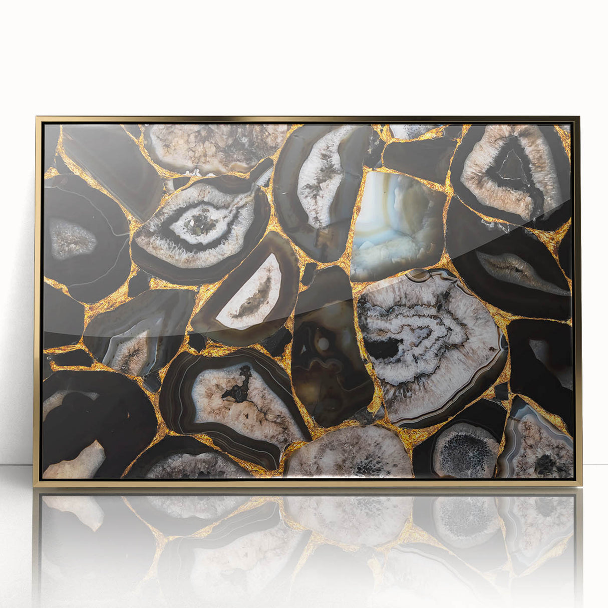 Framed wall art featuring an abstract design of strokes and lines in gold and white tones, ideal for modern home decor, showcasing elegance and sophistication.