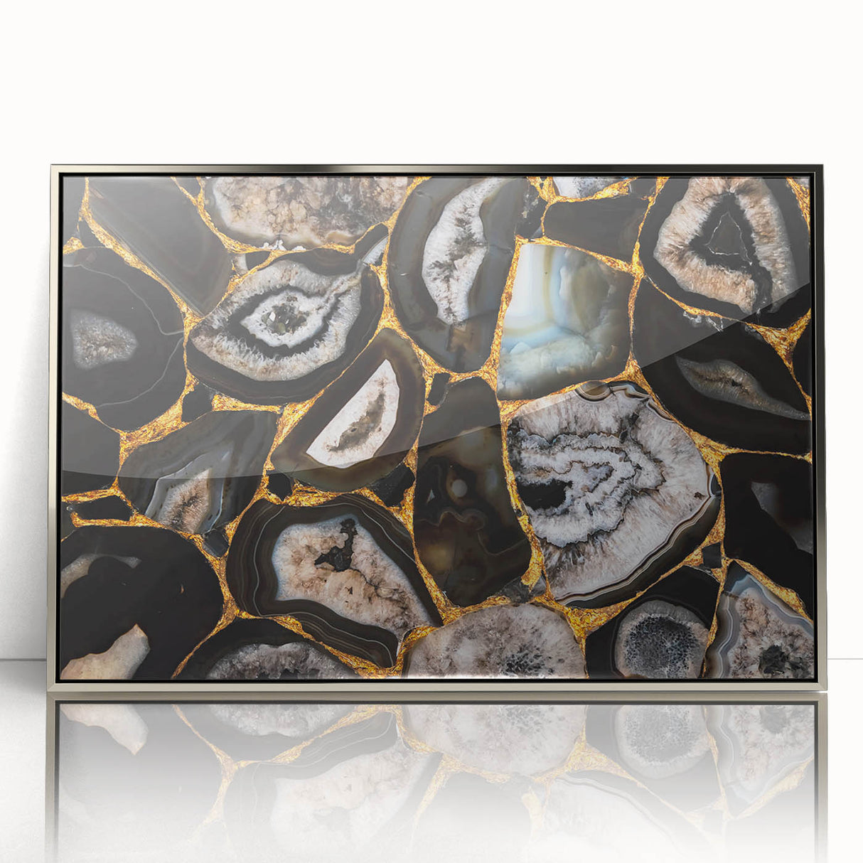 Framed wall art featuring an abstract design of colorful strokes and lines in a sleek silver frame, perfect for modern home decor and artistic expression.