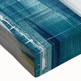 Abstract canvas wall art featuring vibrant strokes and lines in shades of blue, orange, and yellow, designed to enhance modern decor with a dynamic touch.