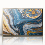 Framed wall art piece showcasing an abstract design with strokes and lines in gold and black hues, perfect for modern decor in homes or offices.