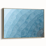 Framed canvas wall art displaying an abstract design of golden strokes and lines, offering a modern aesthetic for elegant home decor. The artwork is set against a neutral background, enhancing its striking visual appeal.