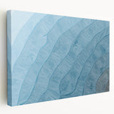 Stretched canvas artwork featuring an abstract design of colorful strokes and lines, showcasing vibrant hues of blue, orange, and yellow, perfect for modern home decor.