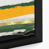 Close-up of a framed canvas wall art featuring an abstract design with vibrant strokes and lines in shades of blue, orange, and white, ideal for modern home decor.