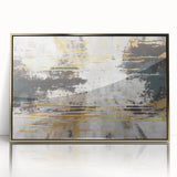 Abstract wall art featuring golden strokes and lines on a white background, framed in a sleek black frame, perfect for modern home decor.