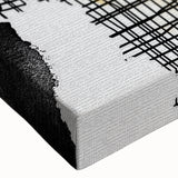 Close-up of a vibrant abstract wall art design showcasing colorful strokes and lines on stretched canvas, perfect for modern home decor and artistic expressions.