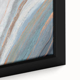 Abstract wall art featuring vibrant strokes and lines in shades of blue, orange, and gold, presented in a stylish framed canvas design. Ideal for modern home decor.