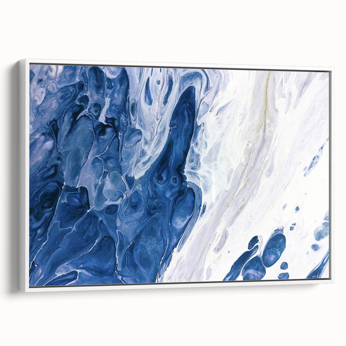 Framed canvas wall art displaying an abstract design of colorful strokes and lines, set against a white background, showcasing modern home decor style.