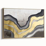 Framed canvas wall art featuring a modern abstract design with gold strokes and lines, showcasing a sleek side view that highlights its elegant finish and artistic flair.