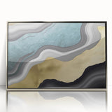 Framed abstract wall art featuring dynamic strokes and lines in silver and gray tones, enhancing modern decor with a sleek, contemporary style.
