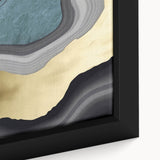 Close-up of a framed canvas artwork showcasing an abstract design with colorful strokes and lines, perfect for modern home decor and artistic expression.