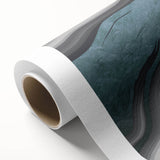 Abstract wall art featuring vibrant strokes and lines in shades of blue, orange, and yellow, ideal for modern decor, showcased on rolled canvas for easy display.