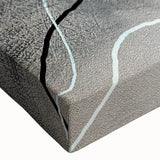 Abstract wall art design featuring vibrant strokes and lines in shades of blue, orange, and yellow, printed on stretched canvas for modern decor. Perfect for enhancing contemporary living spaces or offices.