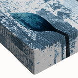 Close-up of an abstract wall art design featuring vibrant strokes and lines in shades of blue, yellow, and pink, printed on stretched canvas for a modern decor accent.