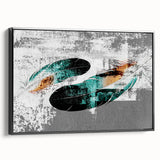 Framed canvas wall art showcasing an abstract design of colorful strokes and lines, presented in a sleek black frame, ideal for modern home decor.