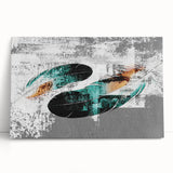 Abstract wall art featuring vibrant strokes and lines in shades of blue, orange, and yellow, displayed on a stretched canvas, adding a modern touch to any decor.