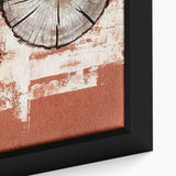 Close-up of a framed abstract wall art piece showcasing vibrant strokes and lines in shades of blue, gold, and white, adding a modern touch to interior decor.