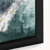 Close-up of a framed canvas wall art featuring an abstract design of colorful strokes and lines, showcasing vibrant hues of blue, orange, and yellow, perfect for modern decor.