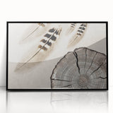 Framed acrylic wall art featuring an abstract design of colorful strokes and lines, showcased in a sleek black frame, perfect for modern home decor.