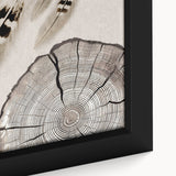 Close-up of a framed canvas artwork showcasing an abstract design with vibrant strokes and lines in shades of blue and gold, perfect for modern home decor.