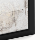 Framed canvas artwork featuring an abstract design with vibrant strokes and lines in shades of blue, orange, and white, ideal for modern home decor.