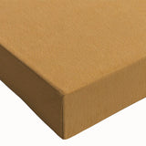 Close-up of a vibrant abstract wall art design featuring bold strokes and lines in shades of blue, yellow, and orange on stretched canvas, ideal for modern decor.