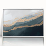 Framed abstract wall art featuring vibrant strokes and lines in shades of blue, orange, and white, set against a sleek white background, perfect for modern decor.