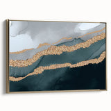 Framed canvas wall art showcasing an abstract design with gold strokes and lines, elegantly displayed at an angle, perfect for modern home decor.