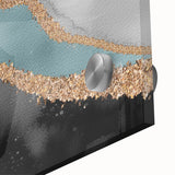 Abstract wall art featuring vibrant strokes and lines in a harmonious blend of blue, orange, and gold, designed to enhance modern home decor. This acrylic glass piece showcases a textured finish that adds depth and sophistication to any room.