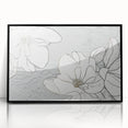 Framed wall art featuring an abstract design of colorful strokes and lines in black and white, perfect for modern home decor. Ideal for enhancing contemporary interiors.