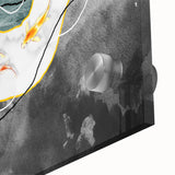 Close-up of an abstract wall art piece showcasing vibrant strokes and lines in shades of blue, orange, and yellow, designed for modern home decor.