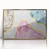 Framed abstract wall art featuring a dynamic design of strokes and lines in gold and neutral tones, adding a touch of elegance to modern interiors.