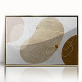 Framed wall art featuring an abstract design with dynamic strokes and lines in gold and neutral tones, perfect for modern home decor. This piece adds elegance and sophistication to any space.