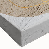 Close-up of an abstract canvas wall art piece showcasing vibrant strokes and lines in shades of blue, orange, and yellow, ideal for modern home decor.