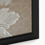 Close-up of an abstract wall art piece showcasing vibrant strokes and lines in shades of blue, orange, and gold, framed elegantly for modern decor.