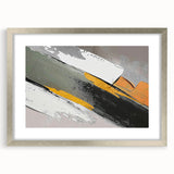 Abstract strokes and lines create a modern wall art piece in a silver frame with a mat, showcasing a contemporary design ideal for stylish home decor.