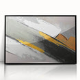 Framed wall art showcasing an abstract design with colorful strokes and lines, featuring a sleek black frame that enhances modern decor in any setting.