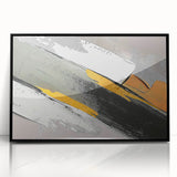 Framed wall art showcasing an abstract design with colorful strokes and lines, featuring a sleek black frame that enhances modern decor in any setting.
