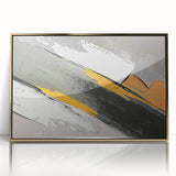 Framed wall art featuring an abstract design of strokes and lines in gold and black, showcasing a modern aesthetic ideal for contemporary decor.
