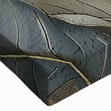 Close-up of an abstract wall art piece showcasing vibrant strokes and lines in shades of blue, yellow, and orange, printed on stretched canvas for modern decor.